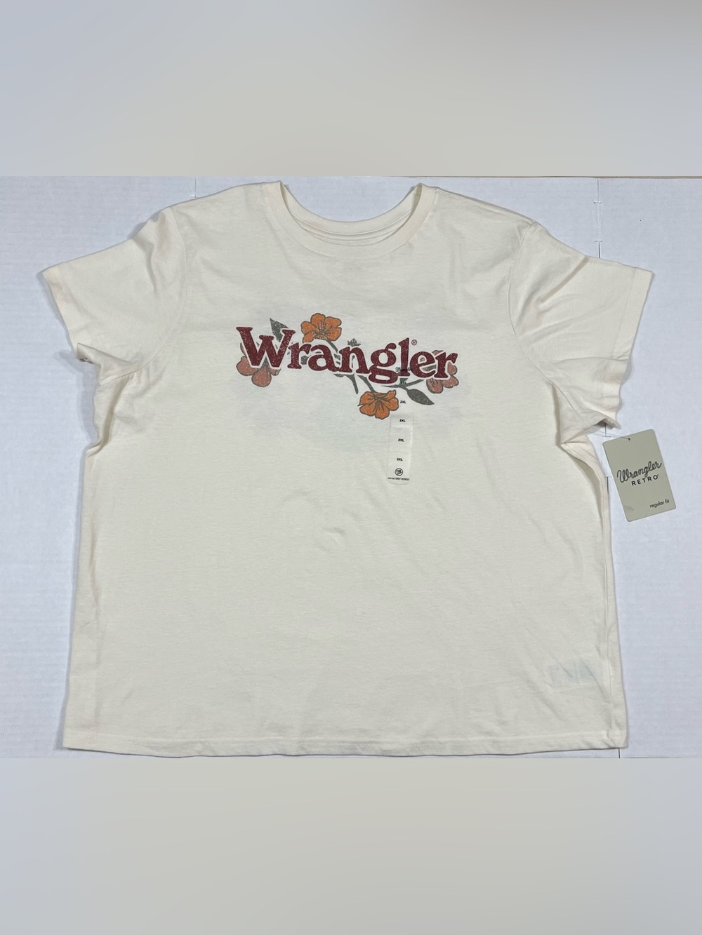 Wrangler Cream Tee with Rust-Brown Logo and Orange Flowers